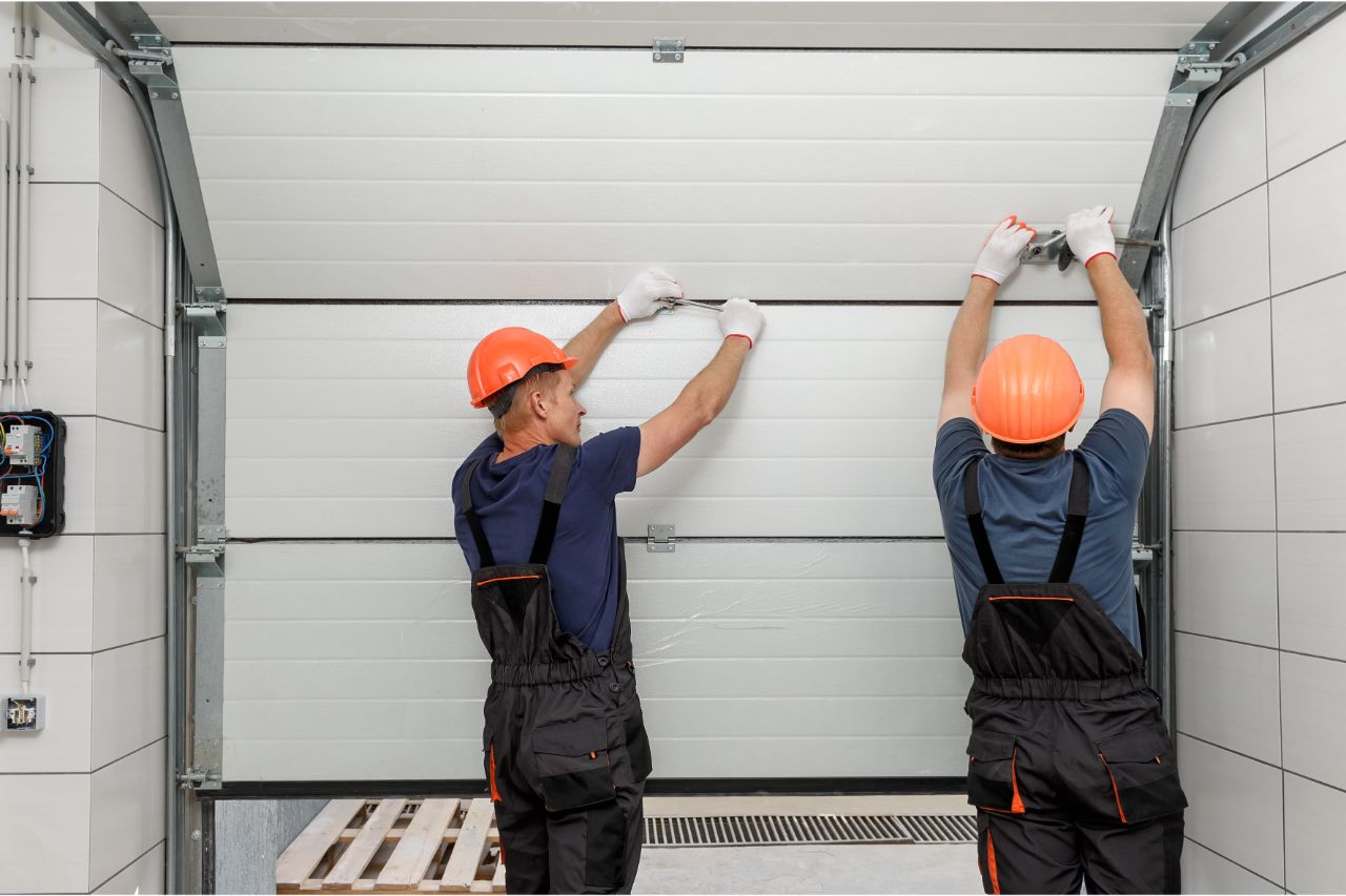 Workers installing CCTV cameras